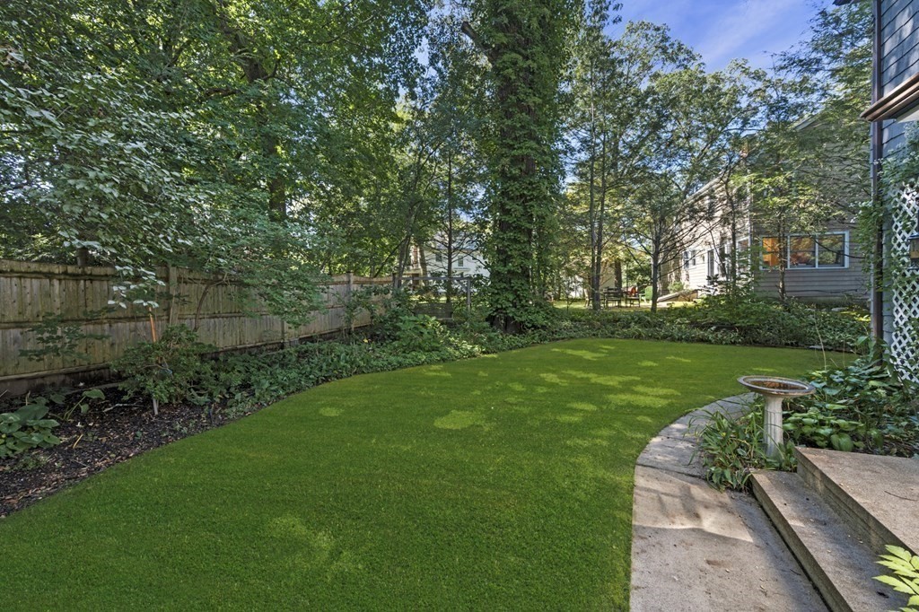 154 Mill Street Newton, MA 02459 - Photo 15 of 15 a view of a garden with large trees