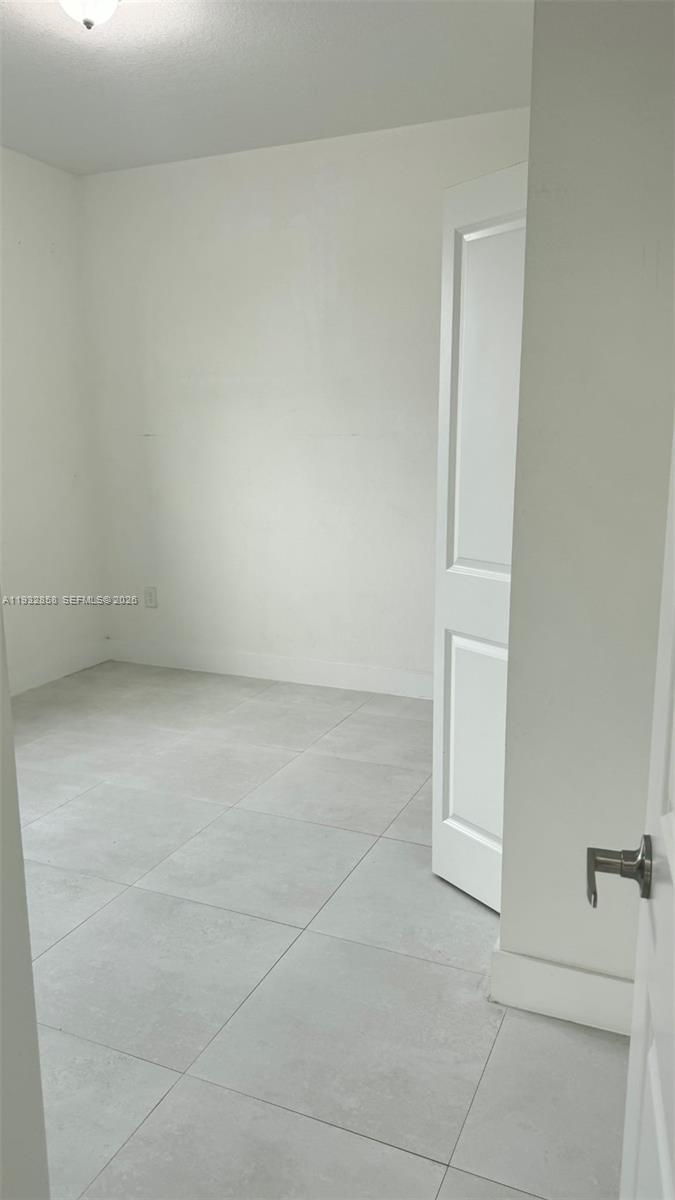 32207 Southwest 196th Avenue, Unit 2 Homestead, FL 33030 - Photo 6 of 8 a view of room