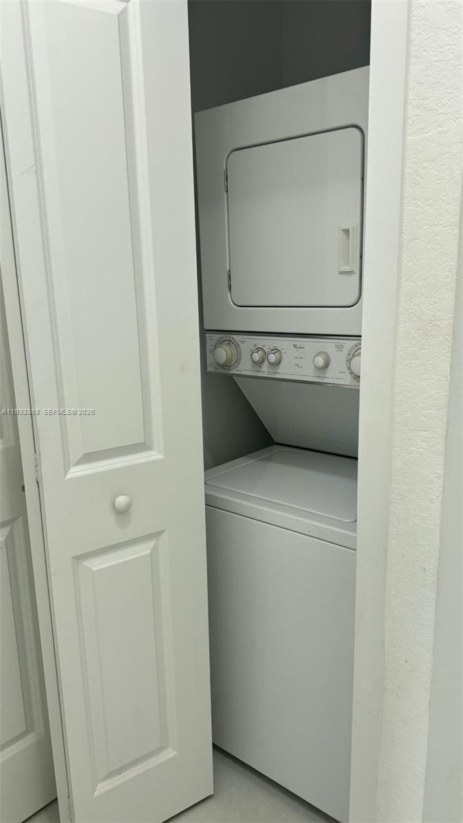32207 Southwest 196th Avenue, Unit 2 Homestead, FL 33030 - Photo 7 of 8 a utility room with dryer and washer