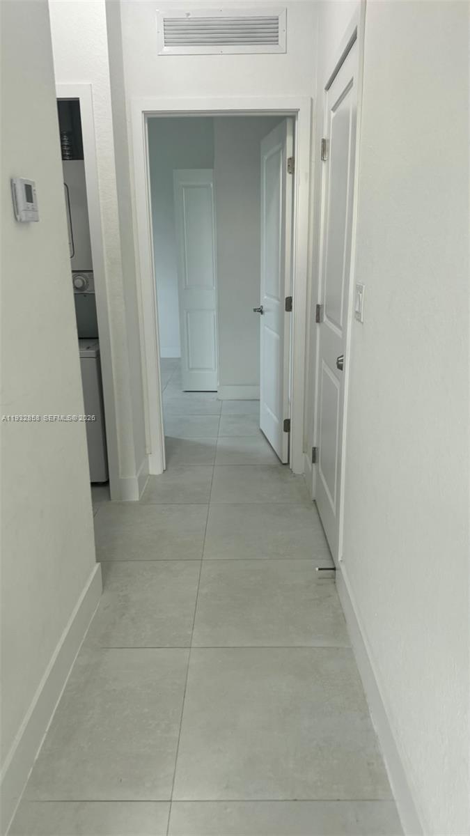 32207 Southwest 196th Avenue, Unit 2 Homestead, FL 33030 - Photo 8 of 8 a view of a hallway