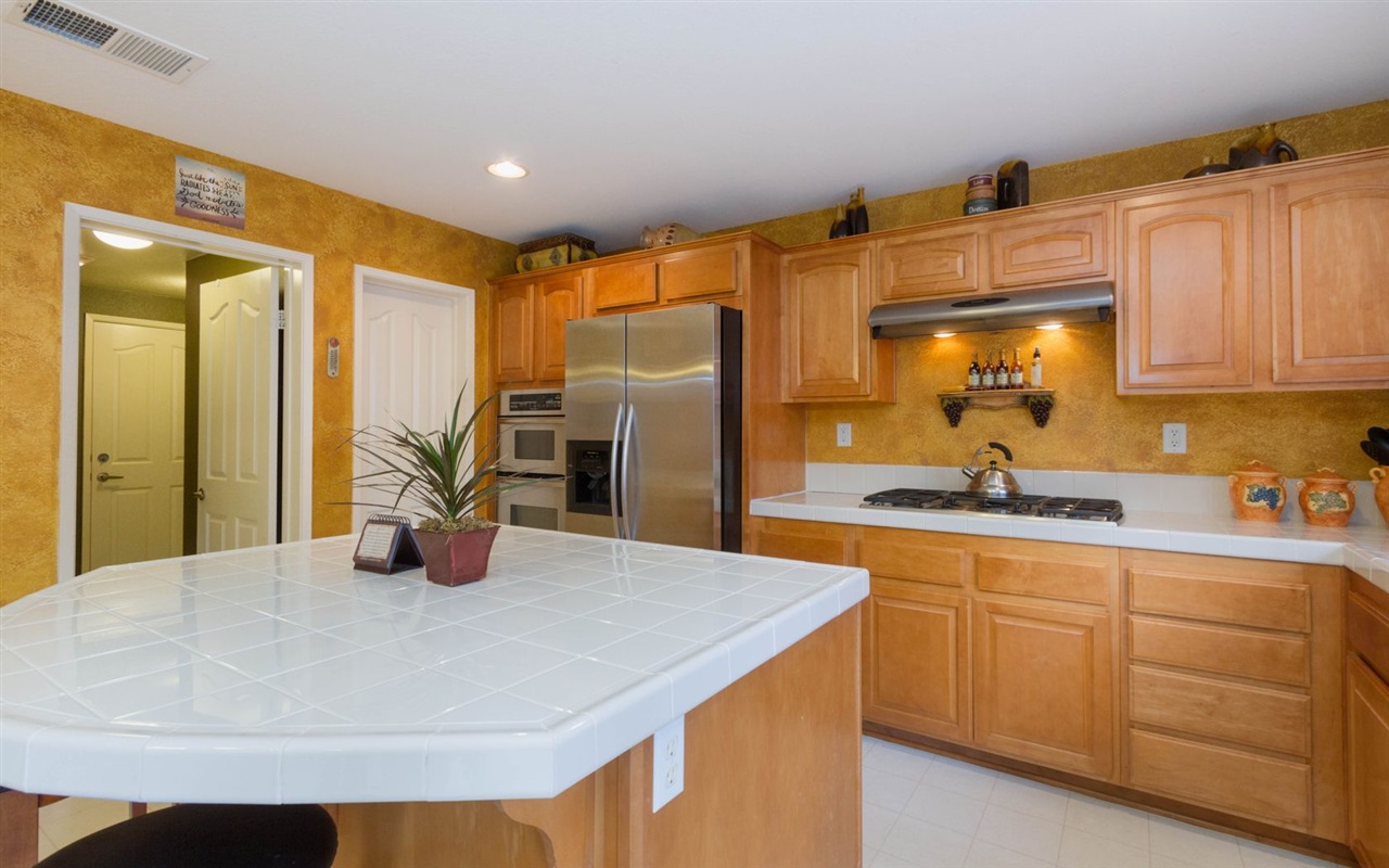 4309 Silver Spring Way Oceanside, CA 92057 - Photo 11 of 25 Upgraded Maple Cabinets with Walk In Pantry