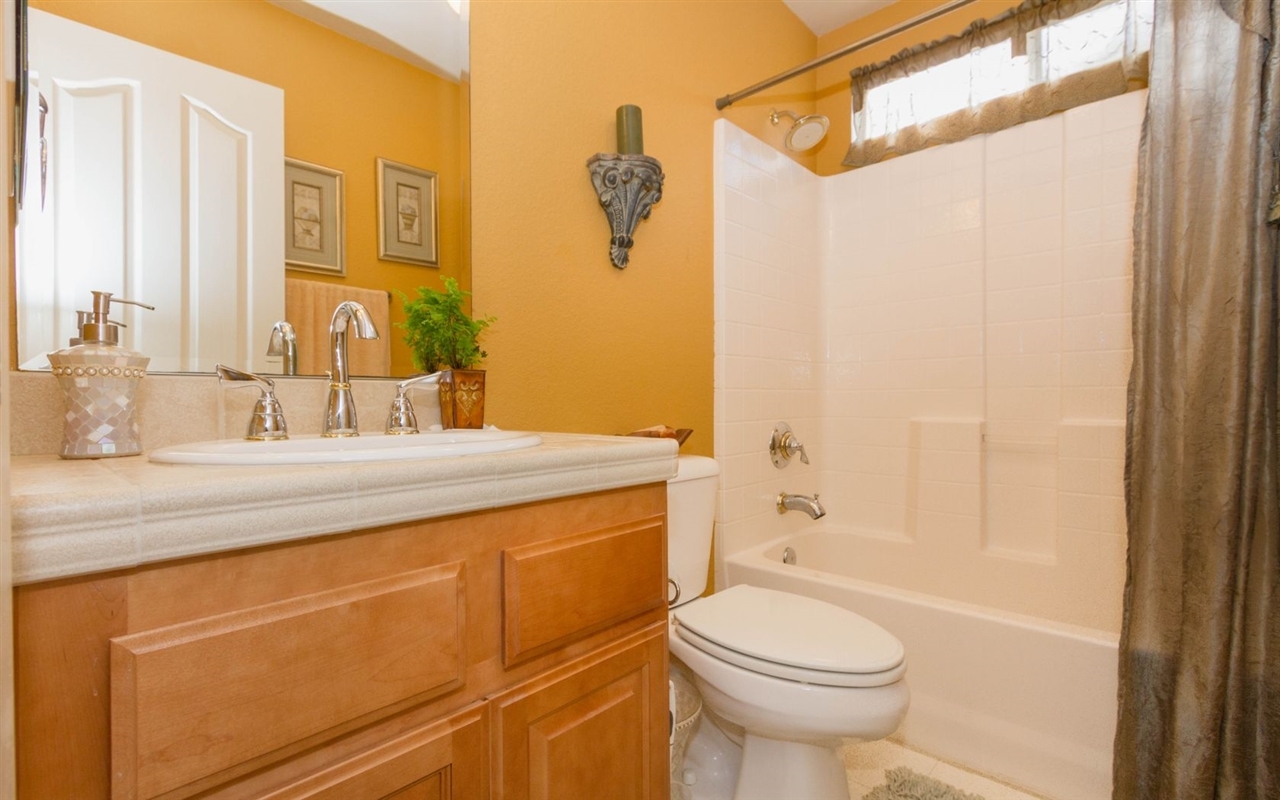 4309 Silver Spring Way Oceanside, CA 92057 - Photo 6 of 25 Downstairs Bathroom next to Downstairs Bedroom