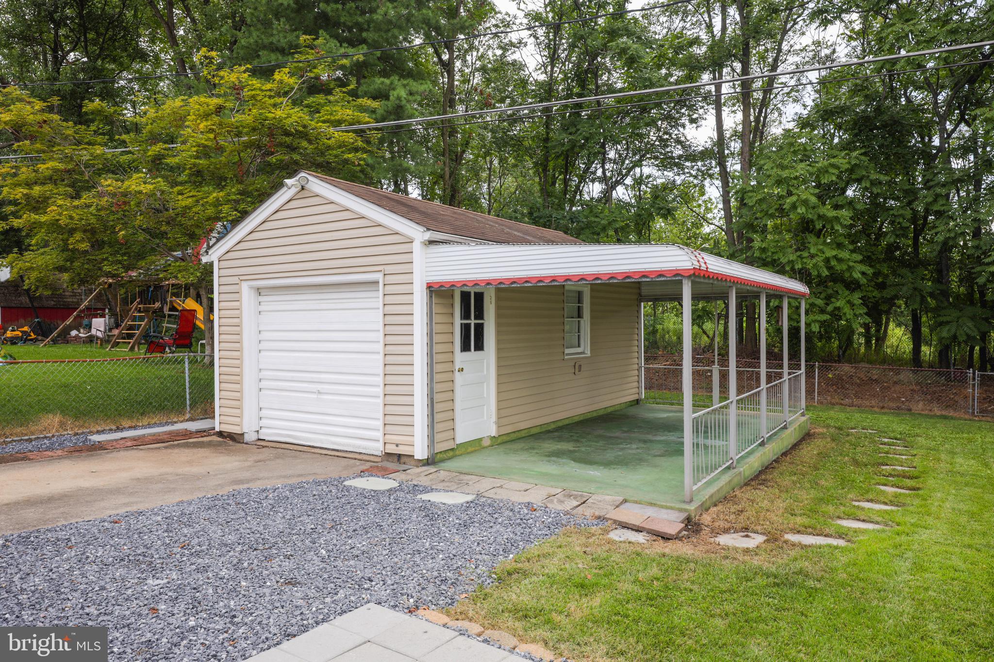 1107 Oakland Terrace Road Halethorpe, MD 21227 - Photo 41 of 42 Rear One Car Garage w/ Covered Porch