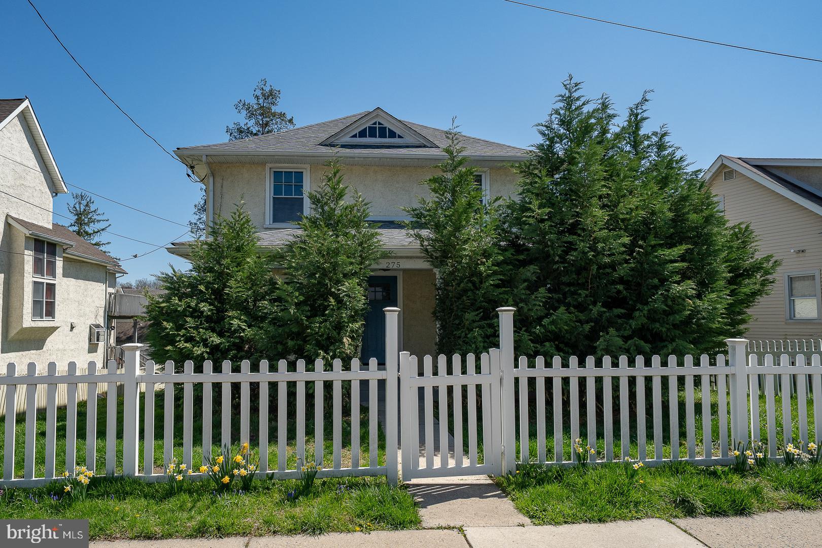 275 Old Eagle School Road Wayne, PA 19087 - Photo 1 of 47 a front view of a house with garden