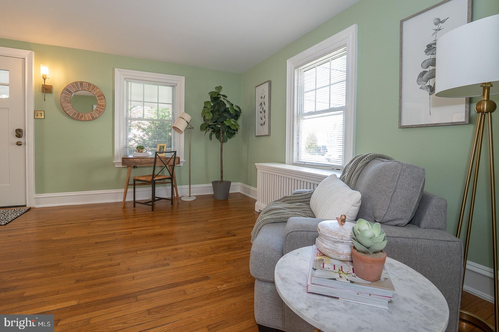 275 Old Eagle School Road Wayne, PA 19087 - Photo 13 of 47 a living room with furniture chandelier and window