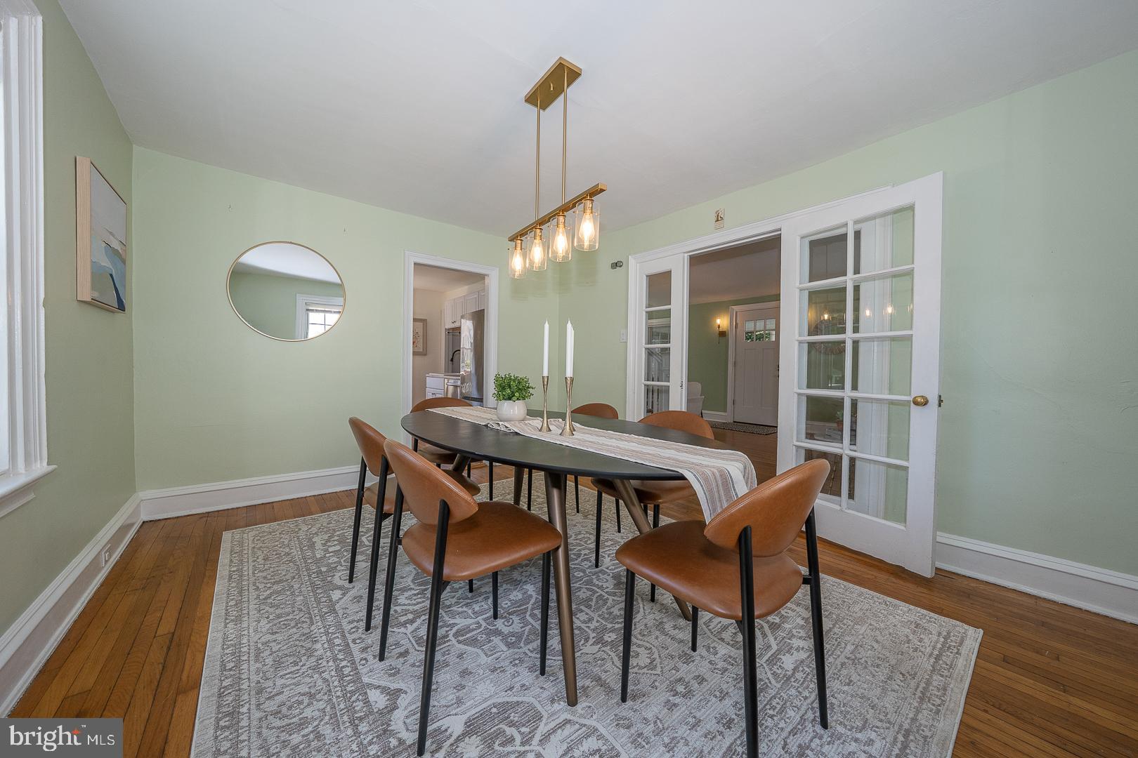 275 Old Eagle School Road Wayne, PA 19087 - Photo 16 of 47 a view of a dining room with furniture and wooden floor