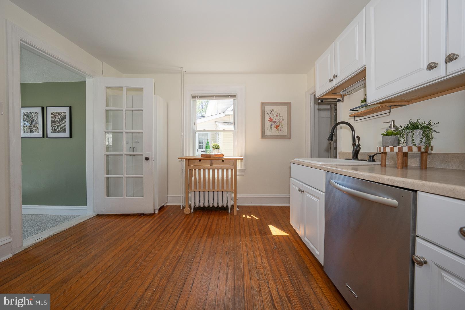 275 Old Eagle School Road Wayne, PA 19087 - Photo 17 of 47 a kitchen with a sink and wooden floor