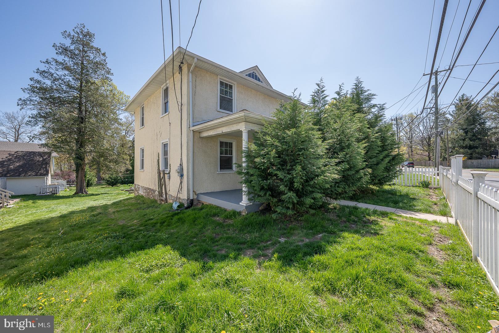275 Old Eagle School Road Wayne, PA 19087 - Photo 2 of 47 a front view of a house with garden