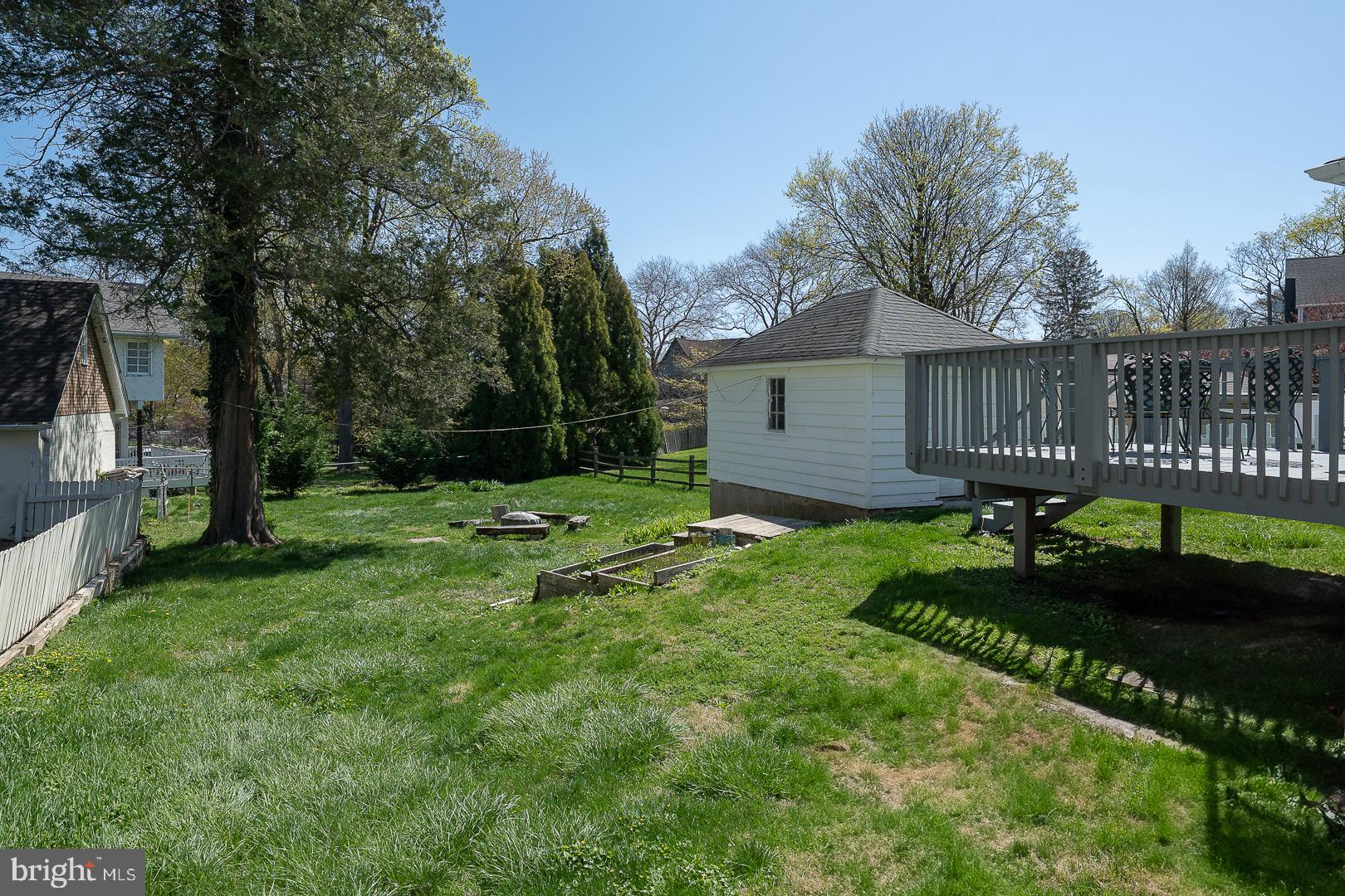 275 Old Eagle School Road Wayne, PA 19087 - Photo 41 of 47 a view of a house with a backyard and a garden