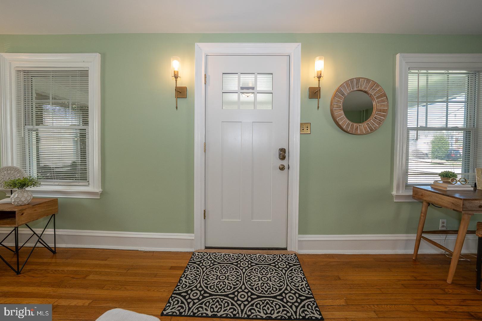 275 Old Eagle School Road Wayne, PA 19087 - Photo 5 of 47 a view of a livingroom with wooden floor and a window