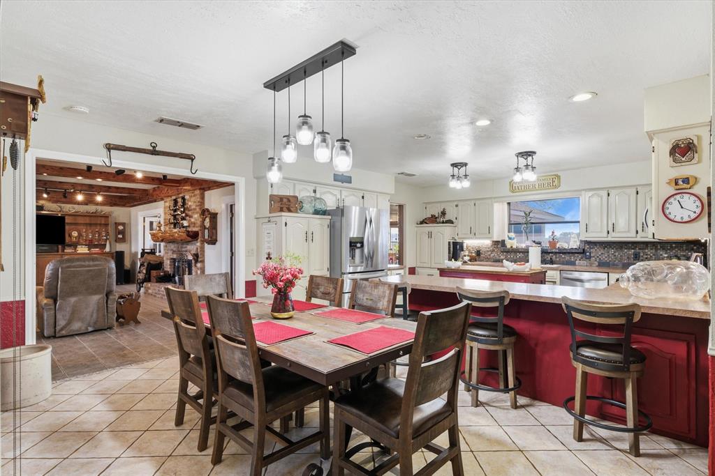 1700 Fm 1995 Van, TX 75790 - Photo 31 of 40 a dining area with a table chairs and kitchen view