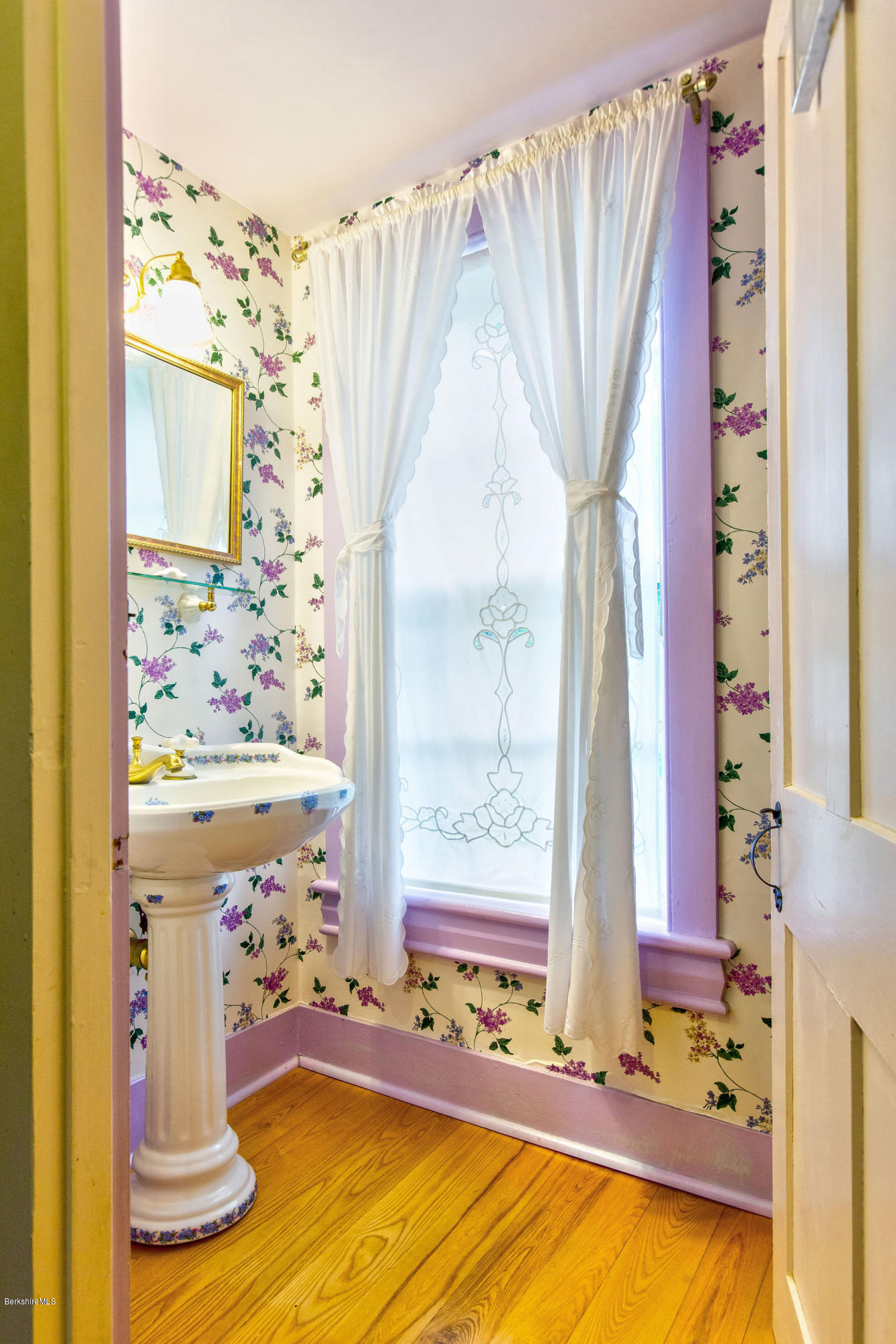 246 Whitman Road Hancock, MA 01267 - Photo 17 of 38 a bathroom with a tub and a large window