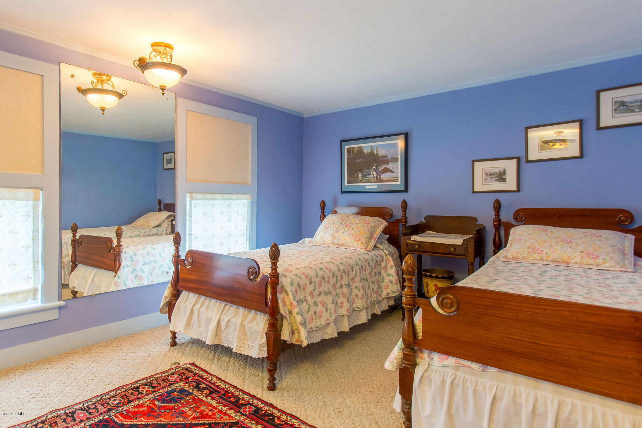 246 Whitman Road Hancock, MA 01267 - Photo 24 of 38 a bedroom with two beds and painting on the wall