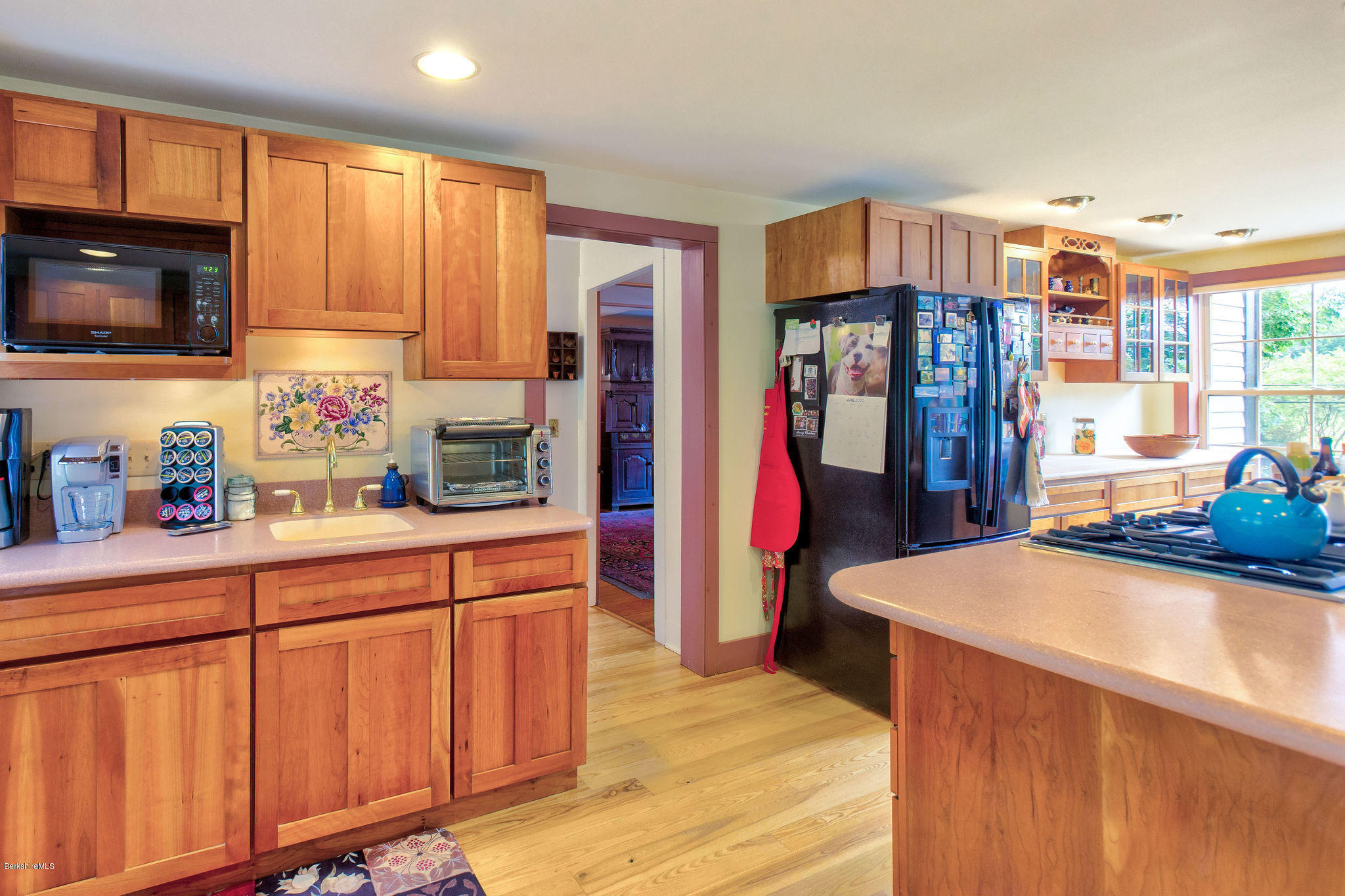 246 Whitman Road Hancock, MA 01267 - Photo 9 of 38 a kitchen with stainless steel appliances granite countertop a refrigerator and a sink