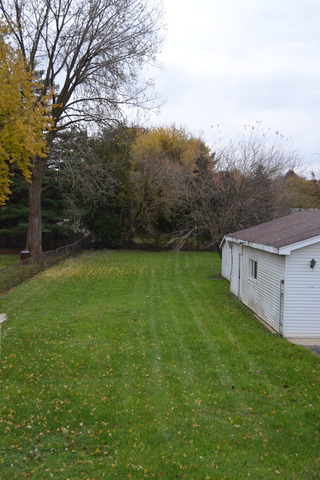 1S205 Valley Road Lombard, IL 60148 - Photo 20 of 21 a backyard of a house with lots of green space