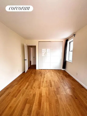 a front view of a building with sitting area