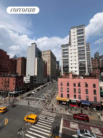 a city street filled with lots of traffic