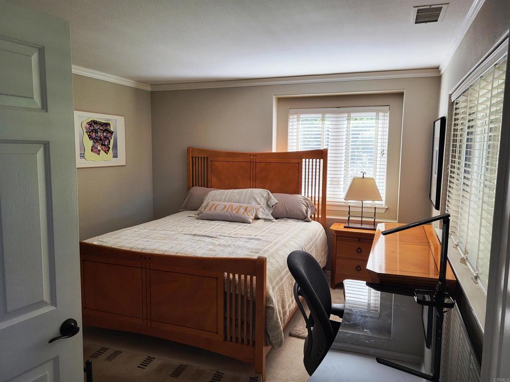 1879 Fox Bridge Court Fallbrook, CA 92028 - Photo 18 of 21 First Floor Bedroom & Full Bath with walk-in close