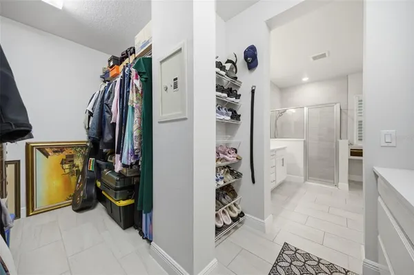 a kitchen with a refrigerator and a stove