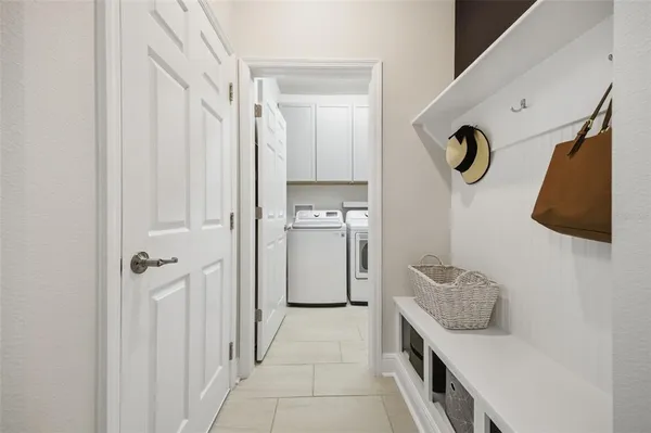 a view of a lake with houses in the back