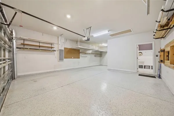 a view of a swimming pool with outdoor seating and yard