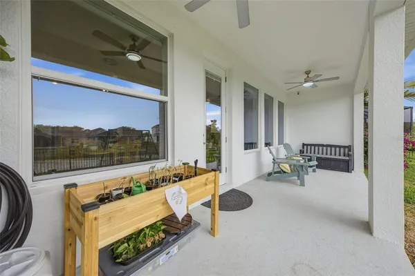 an aerial view of a house with outdoor space swimming pool