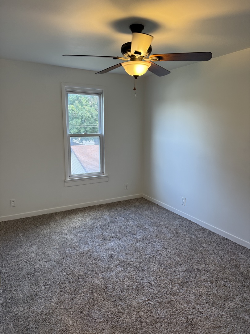 405 North Church Street Princeton, IL 61356 - Photo 19 of 24 an empty room with a window