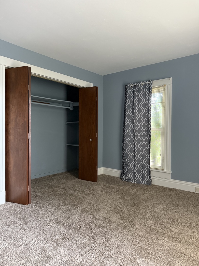 405 North Church Street Princeton, IL 61356 - Photo 24 of 24 an empty room with closet and a window