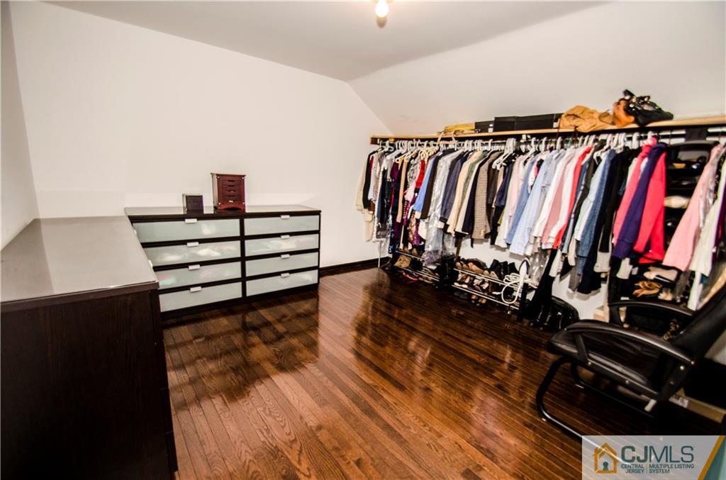 29 Yard Road Pennington, NJ 08534 - Photo 17 of 25 a view of walk in closet with clothes and shoes
