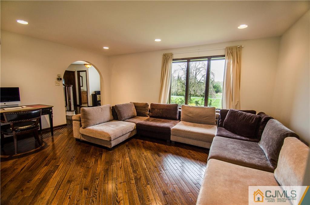 29 Yard Road Pennington, NJ 08534 - Photo 4 of 25 a living room with furniture and a wooden floor