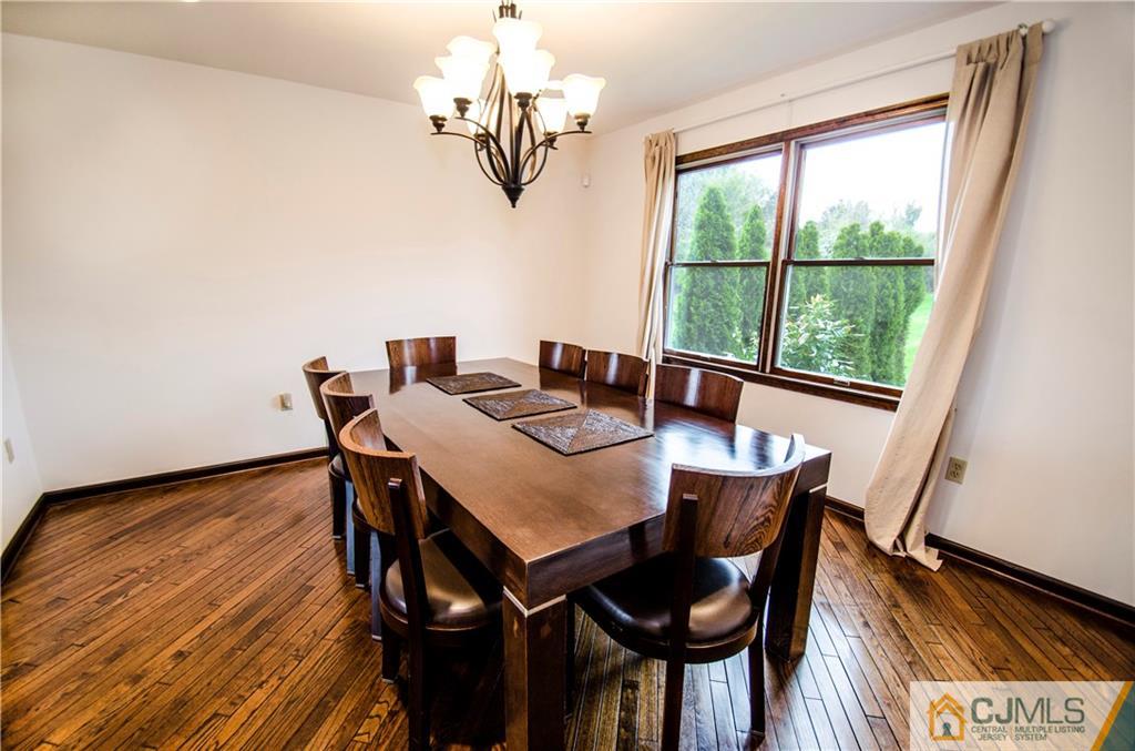 29 Yard Road Pennington, NJ 08534 - Photo 5 of 25 a view of a dining room with furniture window and outside view