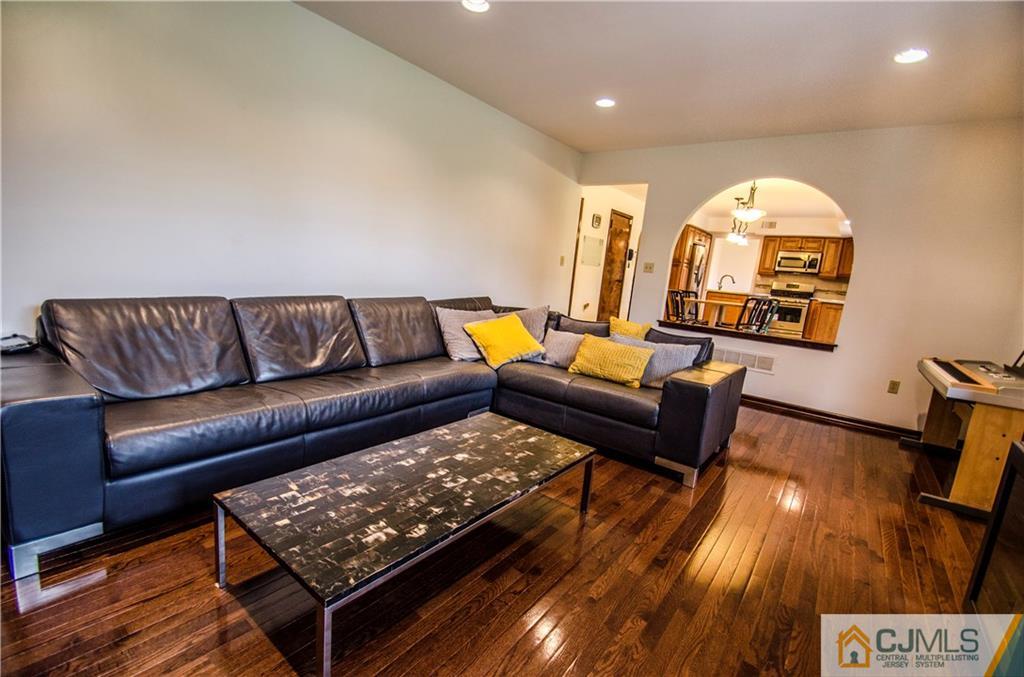 29 Yard Road Pennington, NJ 08534 - Photo 10 of 25 a living room with furniture and a wooden floor