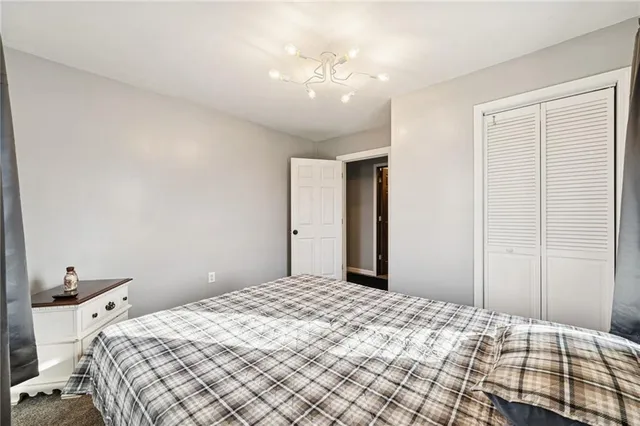 a room with closet and a window