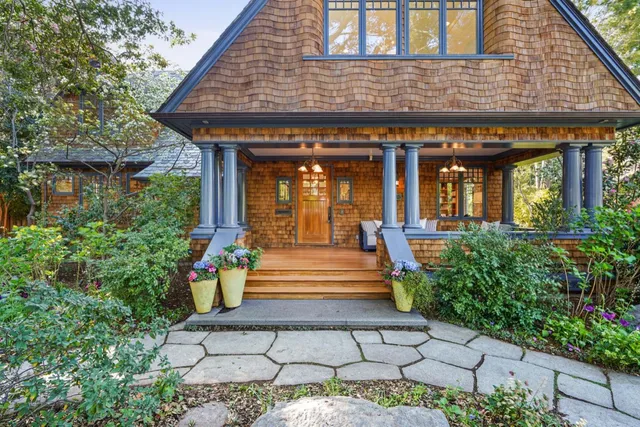 a view of a patio with a table chairs and a patio