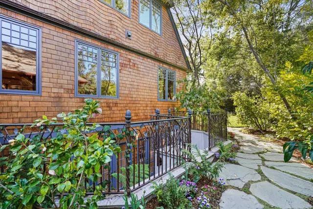 a stove top oven sitting inside of a kitchen