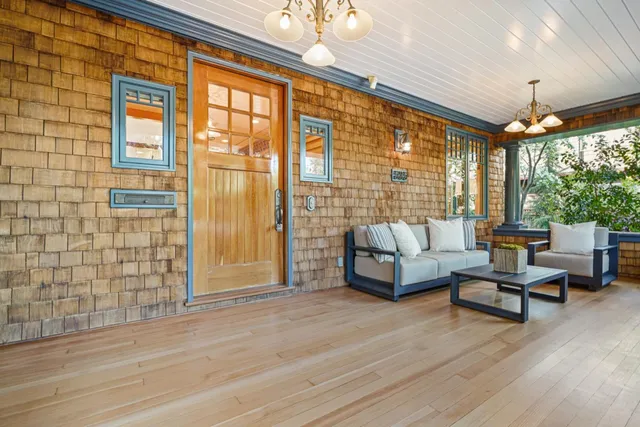 a living room with furniture and window