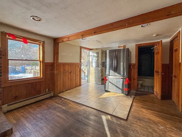 a view of livingroom with furniture and door