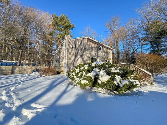 a view of a street with cars