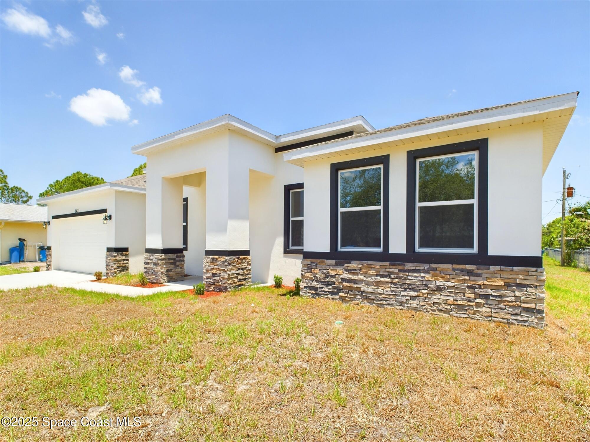 692 Mistletoe Street Palm Bay, FL 32908 - Photo 3 of 47 CAM03399G0-PR0030-STILL049