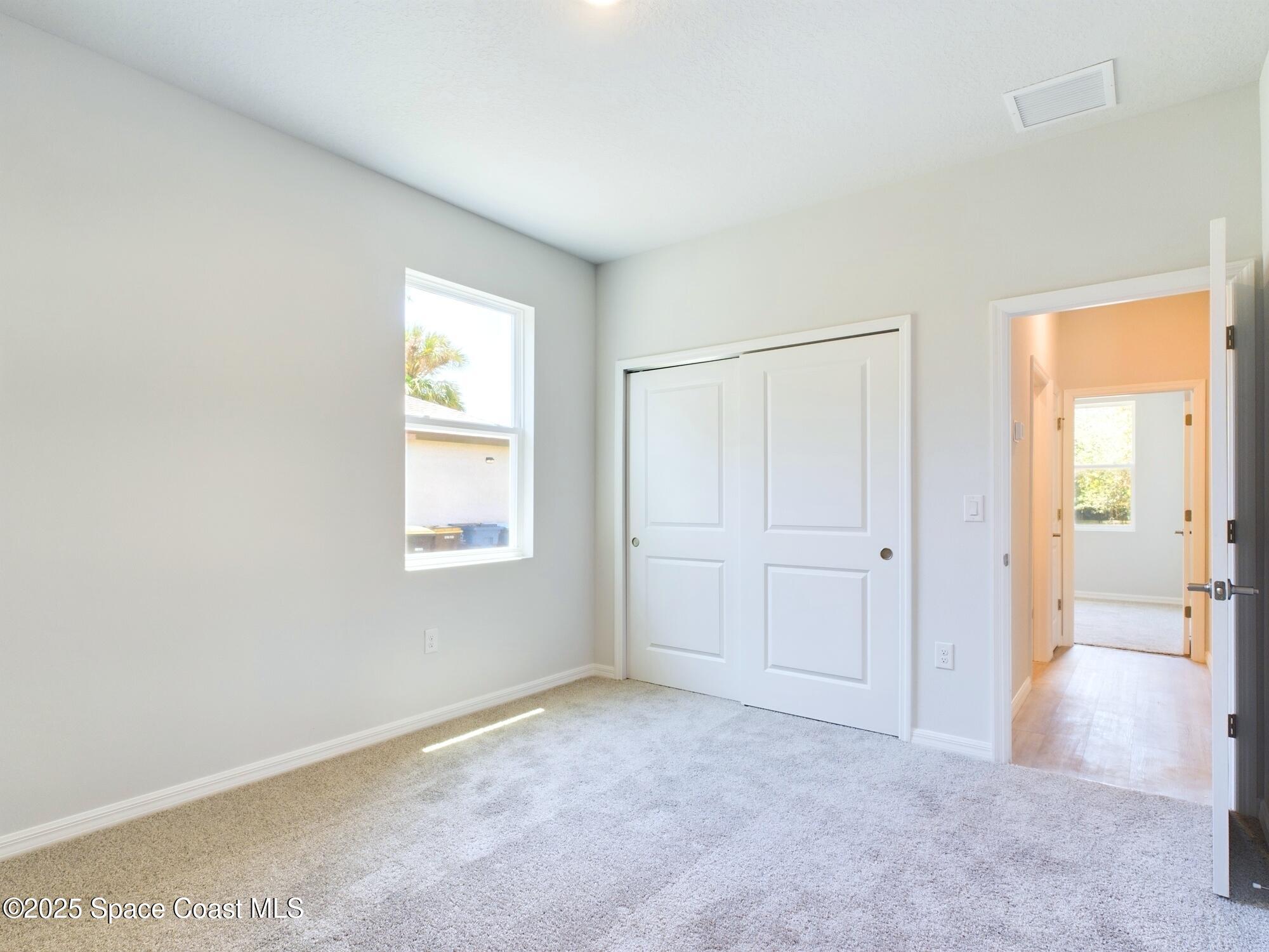 692 Mistletoe Street Palm Bay, FL 32908 - Photo 9 of 47 CAM03399G0-PR0030-STILL002