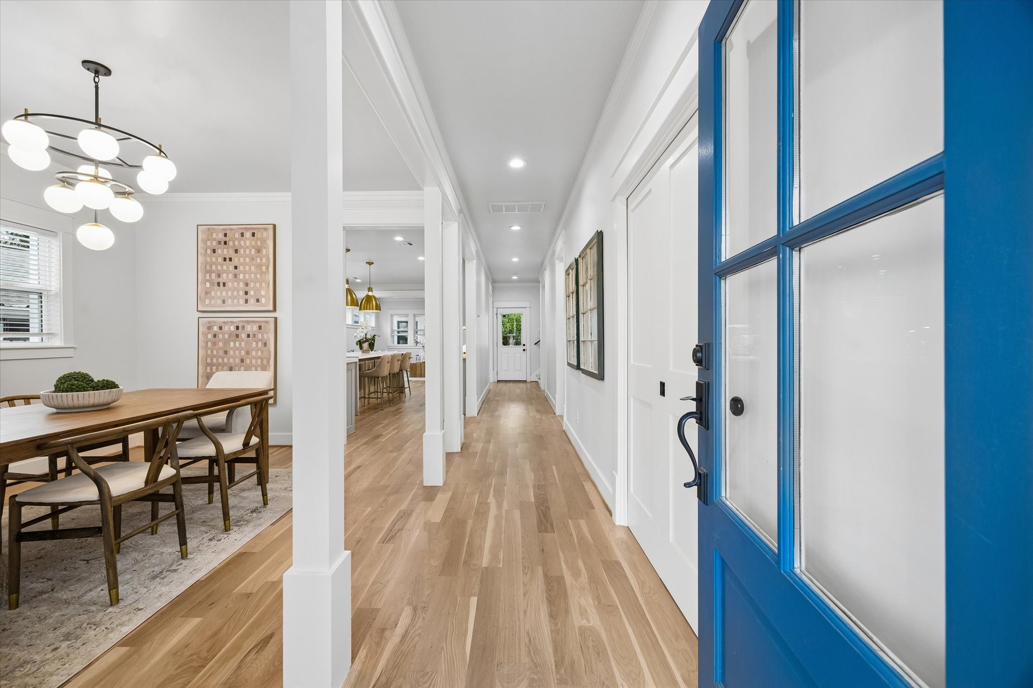 910 Northwood Street Houston, TX 77009 - Photo 4 of 28 a view of a hallway with wooden floor and staircase
