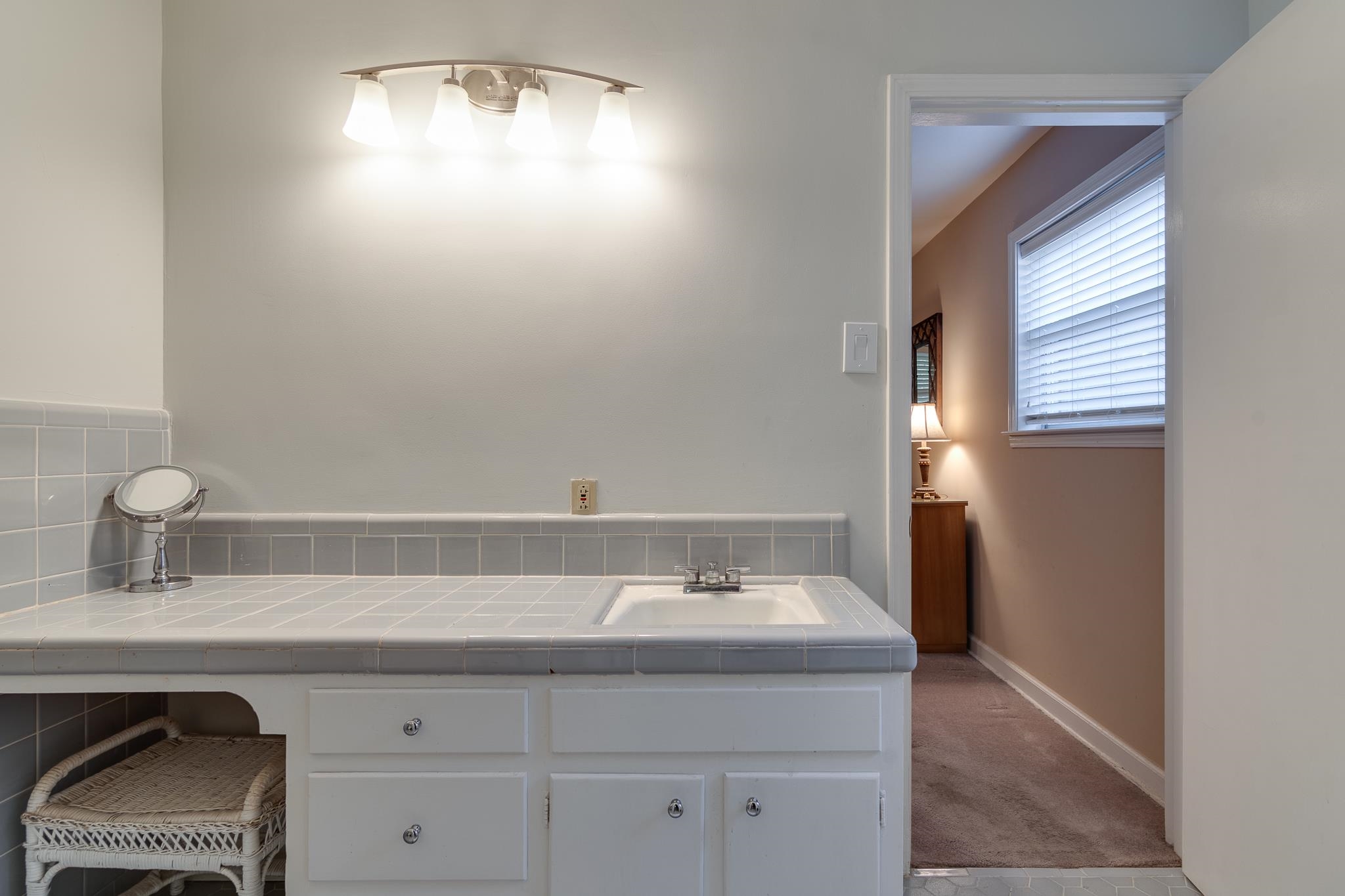121 South Yates Road Memphis, TN 38120 - Photo 33 of 38 a bathroom with a sink and a mirror
