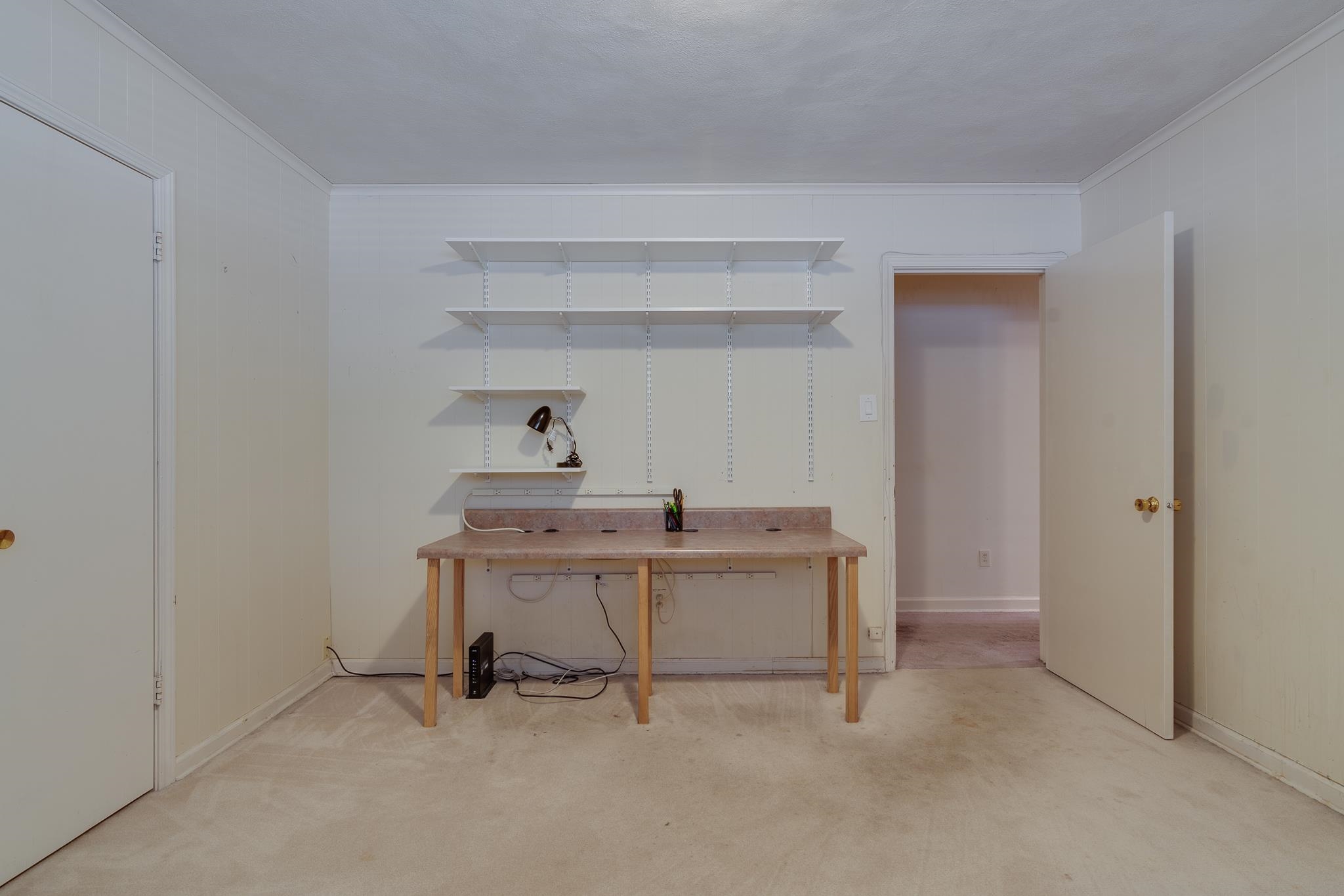 121 South Yates Road Memphis, TN 38120 - Photo 34 of 38 a view of a workspace with furniture