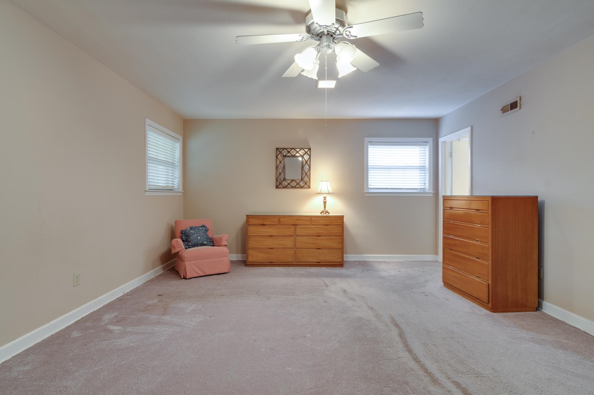 121 South Yates Road Memphis, TN 38120 - Photo 36 of 38 a room with furniture and a chandelier fan