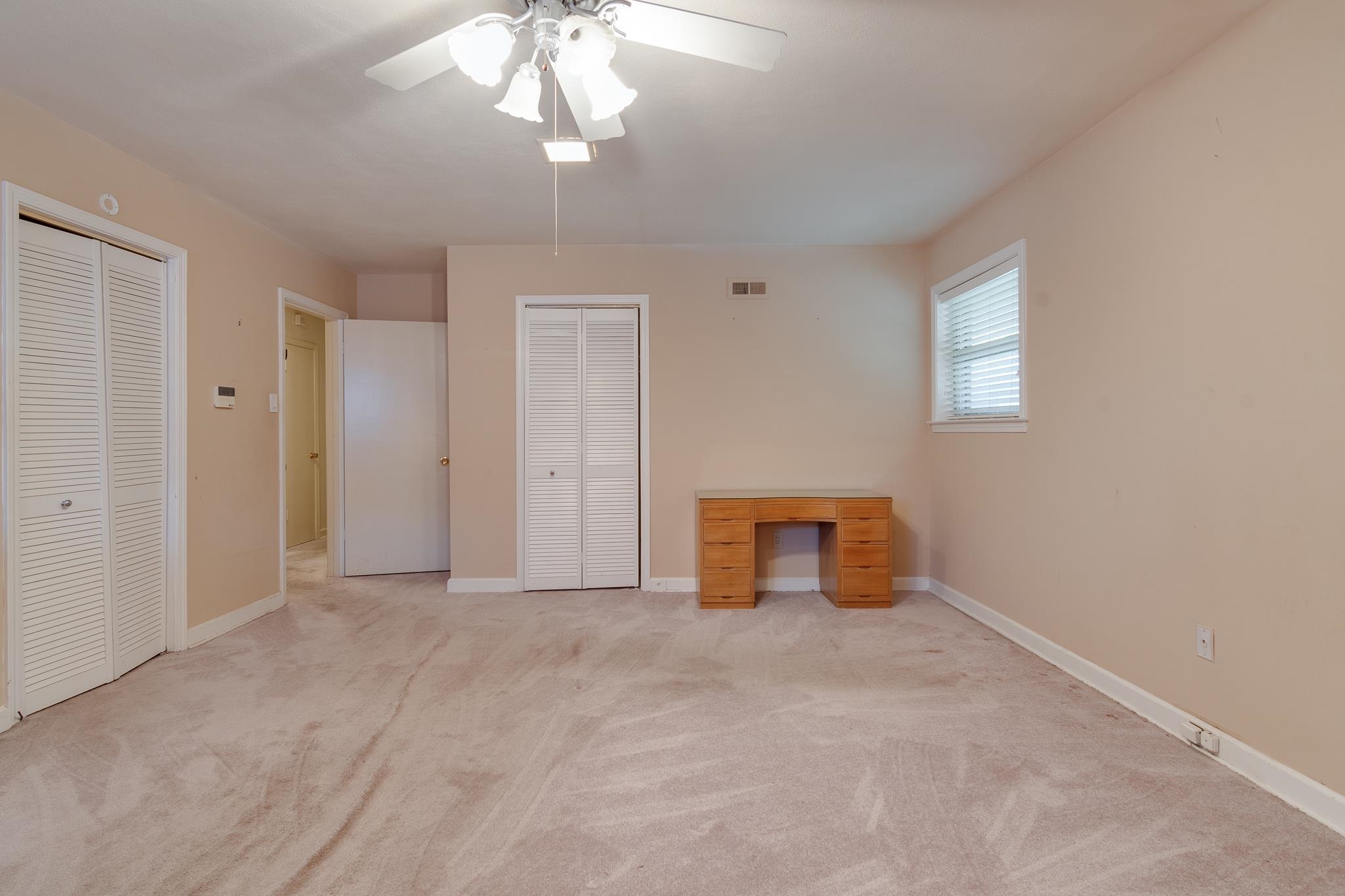121 South Yates Road Memphis, TN 38120 - Photo 37 of 38 an empty room with chandelier fan