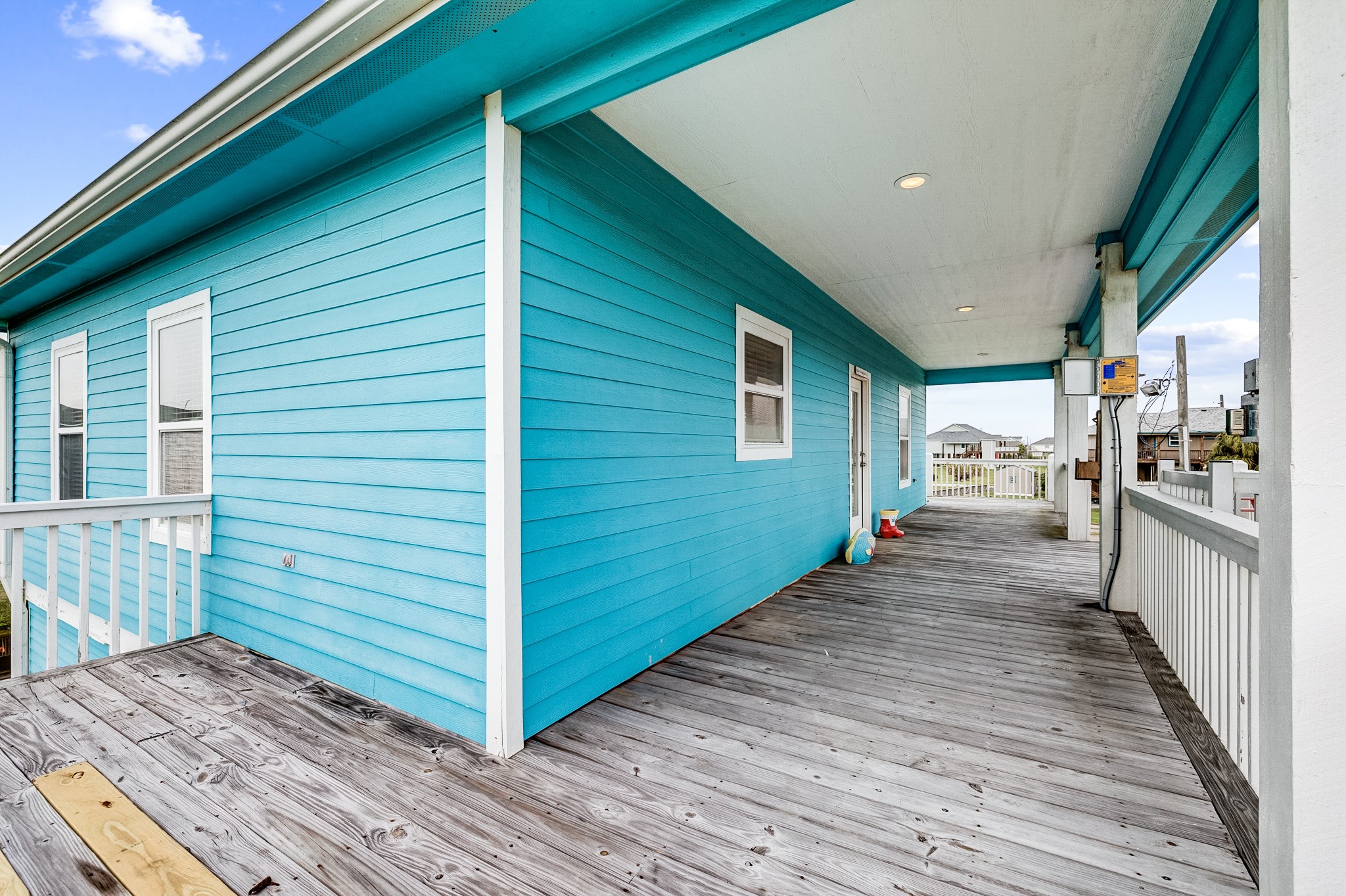 935 Clara Street Crystal Beach, TX 77650 - Photo 5 of 30 a view of a house with a deck