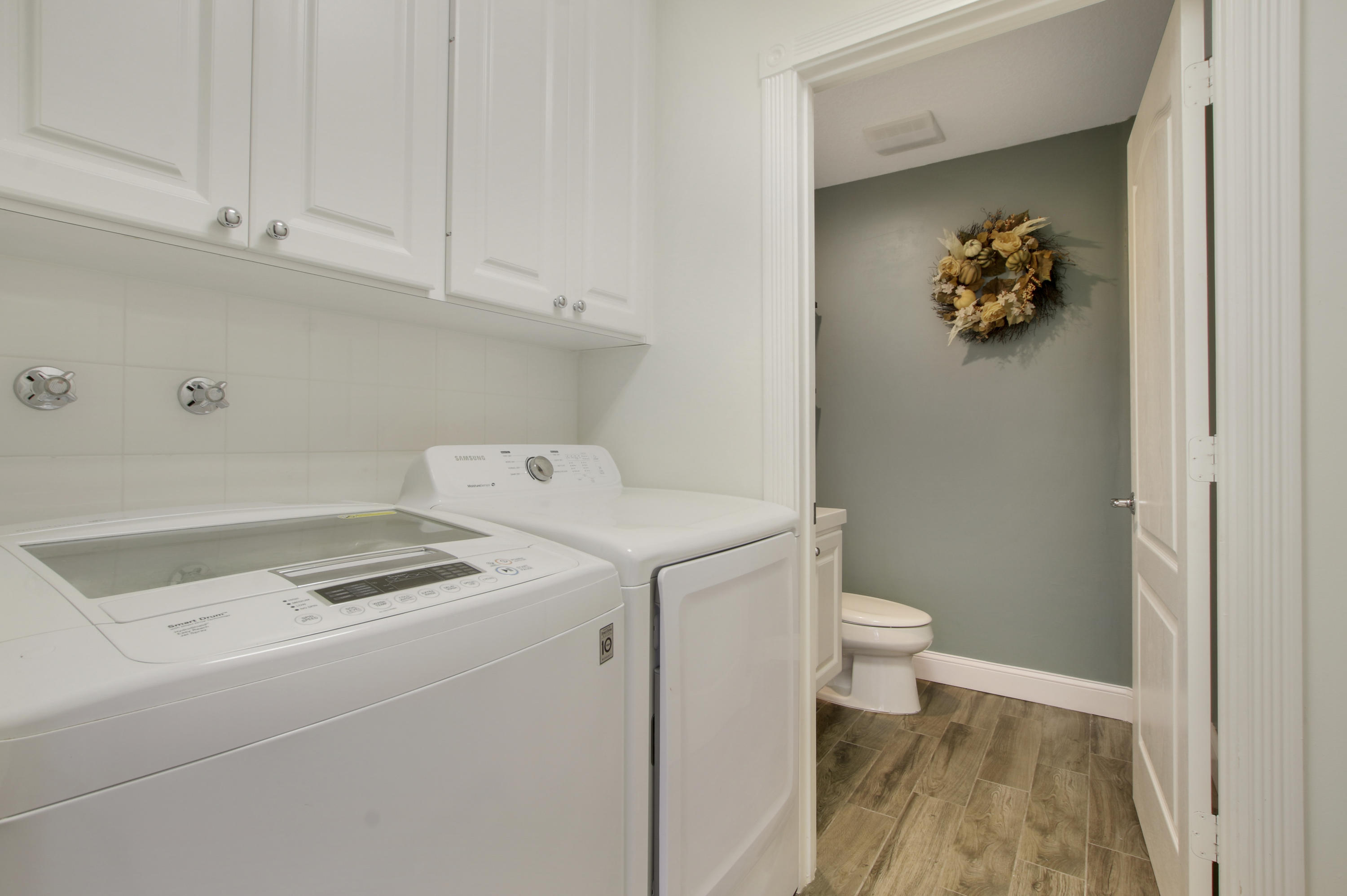 1603 Frederick Small Road Jupiter, FL 33458 - Photo 15 of 36 Laundry/Half Bath