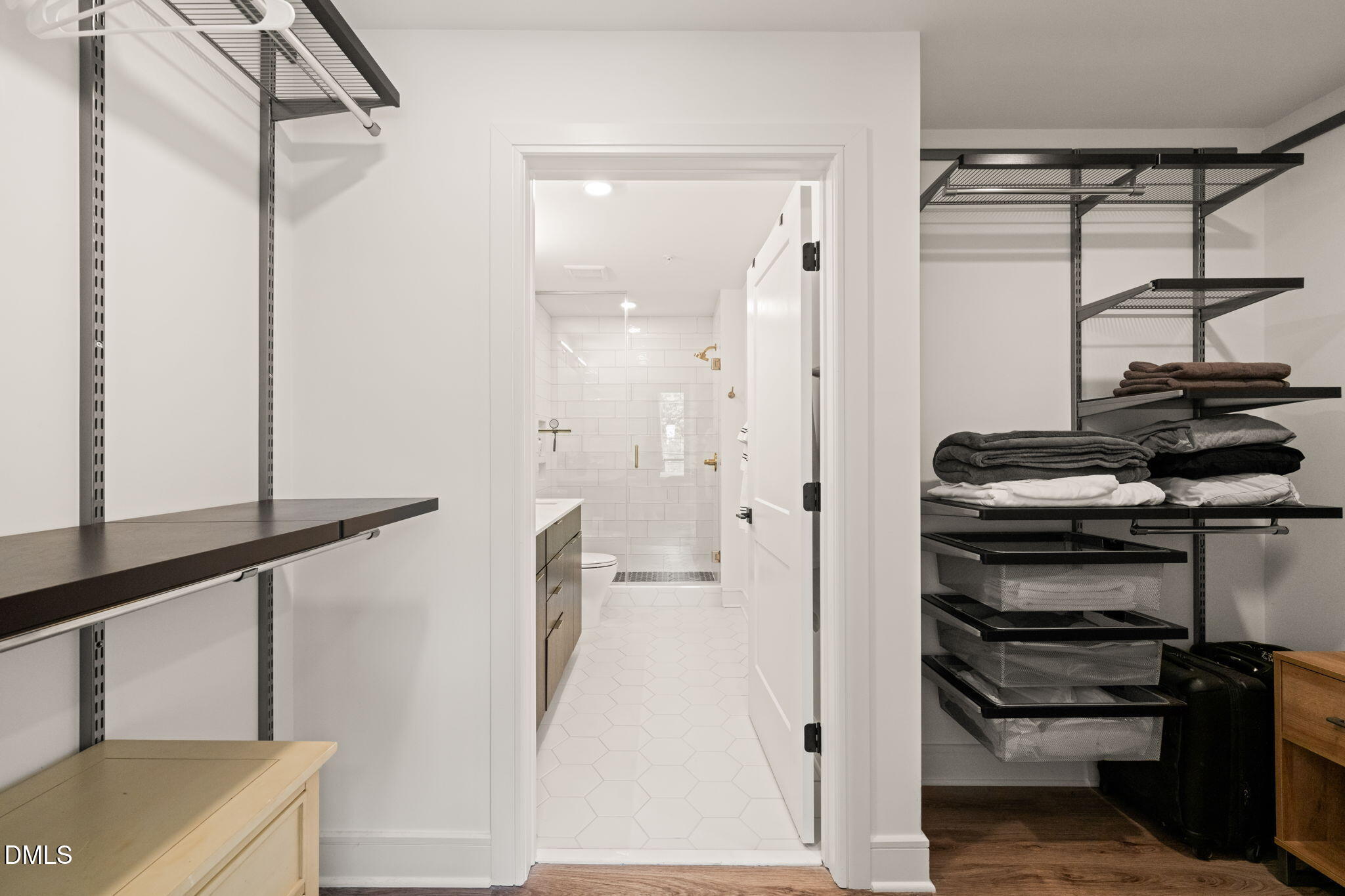 615 West Peace Street, Unit 207 Raleigh, NC 27605 - Photo 9 of 34 a view of a hallway with wooden floor and staircase