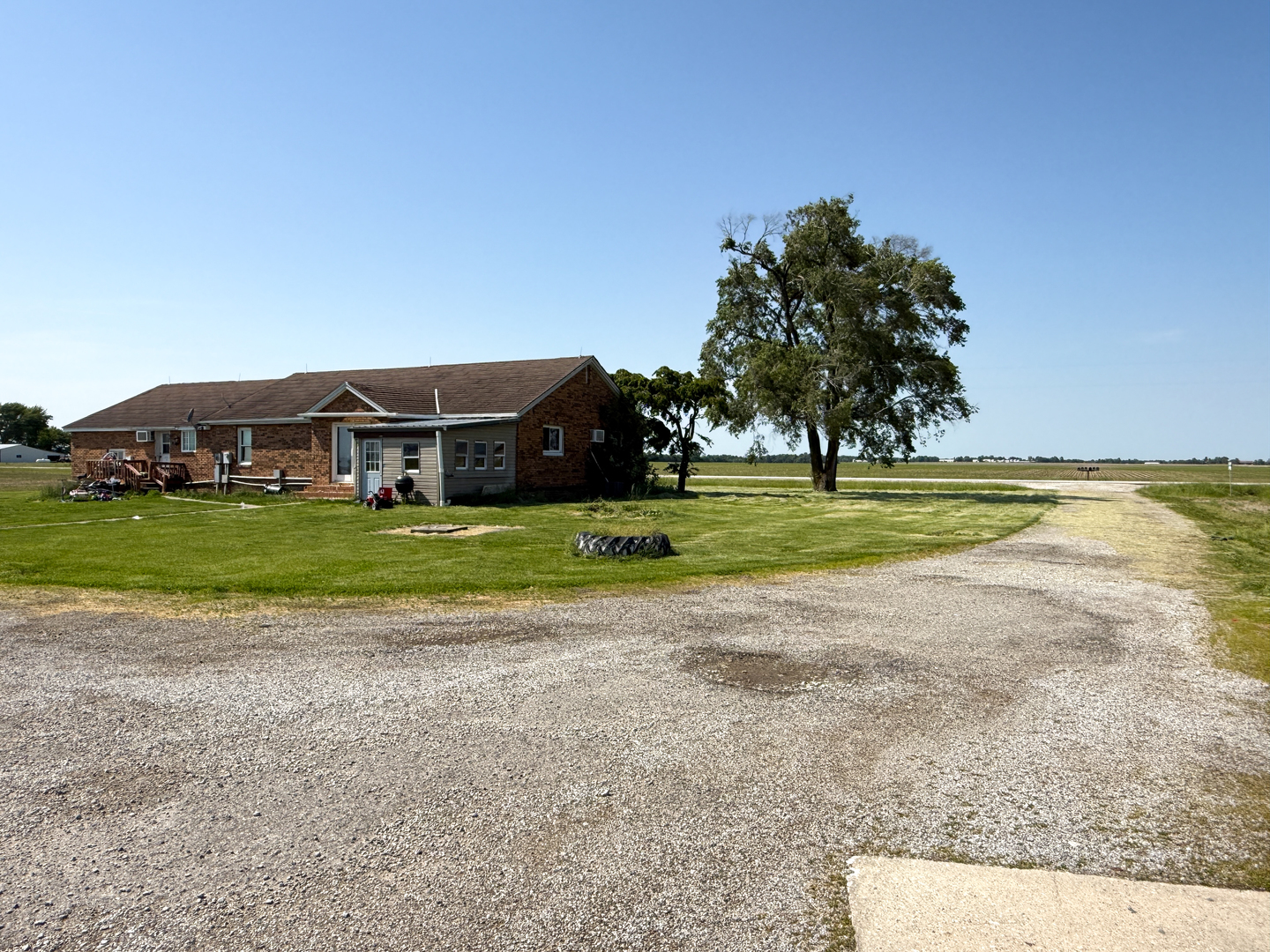 5991 Kinmundy Road Louisville, IL 62858 - Photo 5 of 12 a view of a house with a big yard