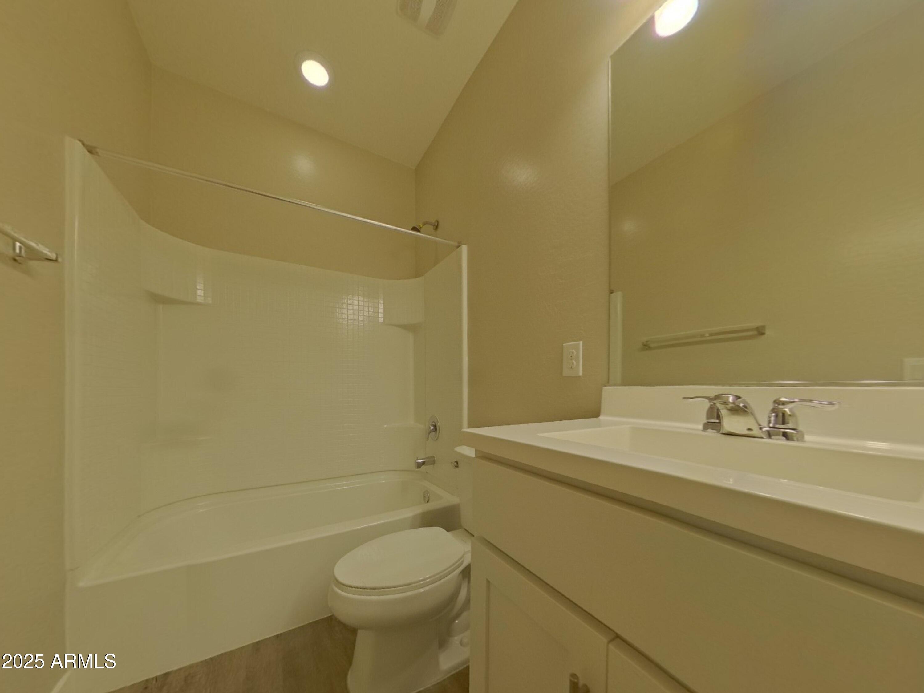2929 North 28th Street, Unit 13 Phoenix, AZ 85016 - Photo 13 of 16 a bathroom with a sink a toilet and shower